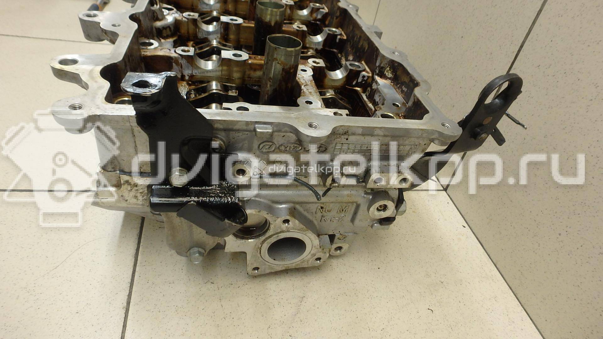 Фото Головка блока для двигателя G4NB для Hyundai (Beijing) / Hyundai / Kia 143-160 л.с 16V 1.8 л бензин 221102E002 {forloop.counter}}