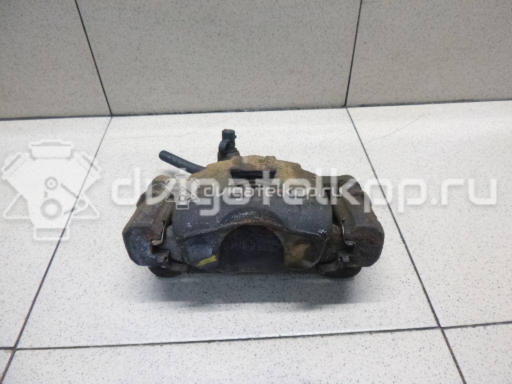 Фото Суппорт тормозной передний правый  96288628 для Chevrolet Spark / Matiz M200, M250 {forloop.counter}}