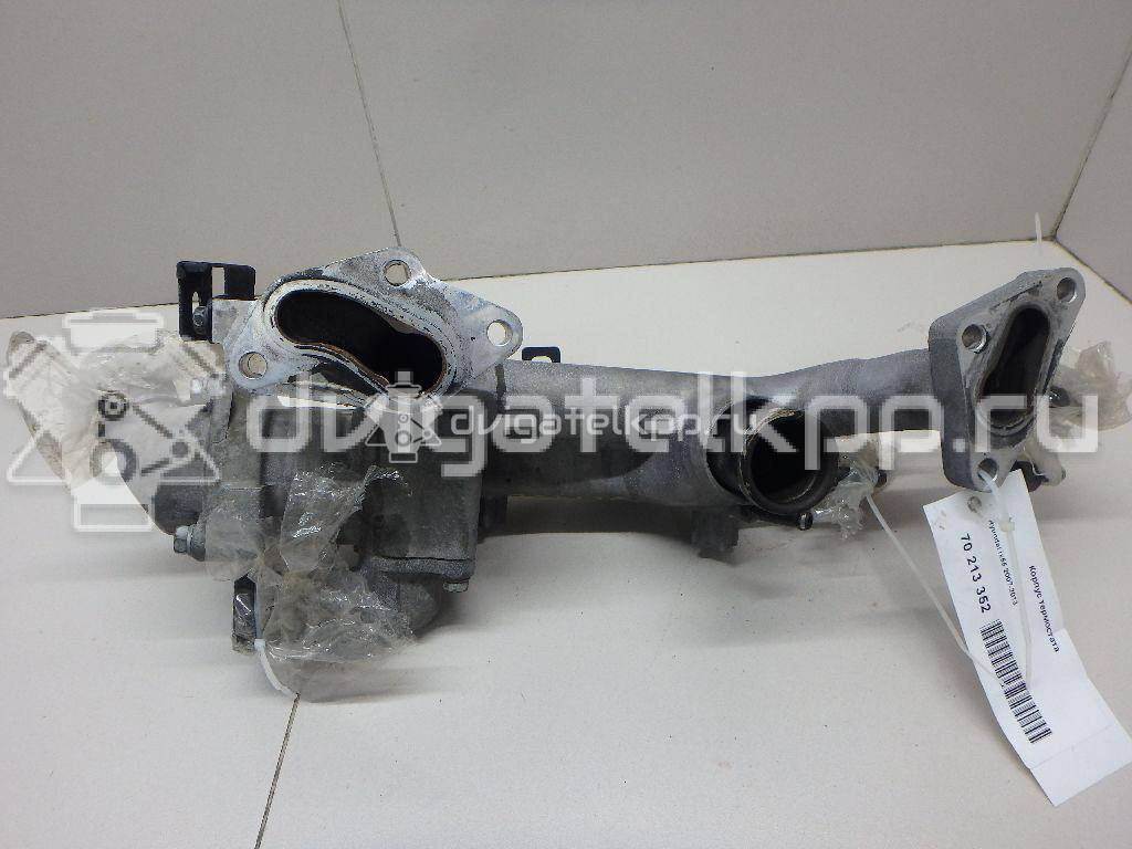 Фото Корпус термостата для двигателя G6DA для Ford Australia / Hyundai / Kia 136 л.с 16V 2.0 л Дизельное топливо 256003C101 {forloop.counter}}