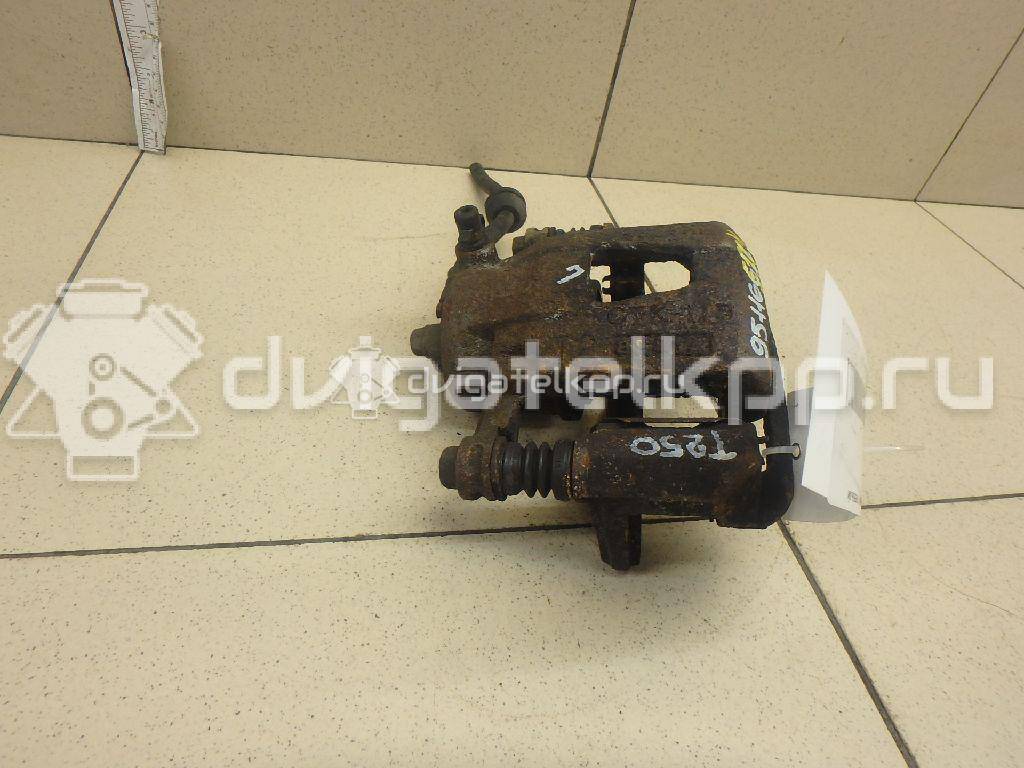 Фото Суппорт тормозной передний левый  96534637 для Chevrolet Kalos / Spark / Aveo {forloop.counter}}