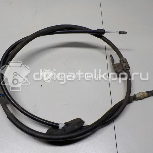 Фото Трос стояночного тормоза левый  13367627 для Chevrolet Cruze