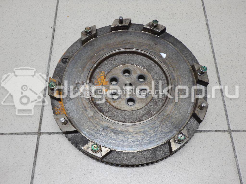 Фото Маховик для двигателя G4GC для Hyundai (Beijing) / Hyundai / Kia 137-141 л.с 16V 2.0 л бензин 2320023810 {forloop.counter}}