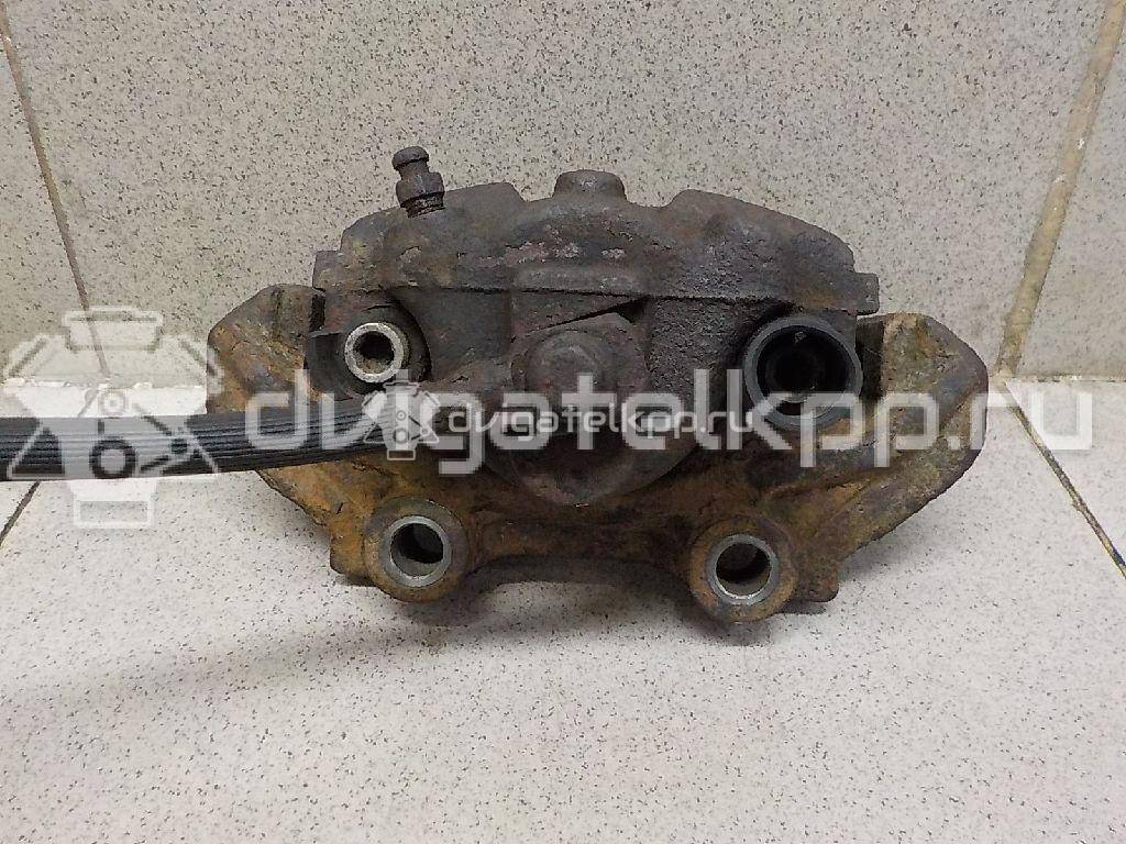 Фото Суппорт тормозной передний левый  90421729 для chevrolet Lanos {forloop.counter}}