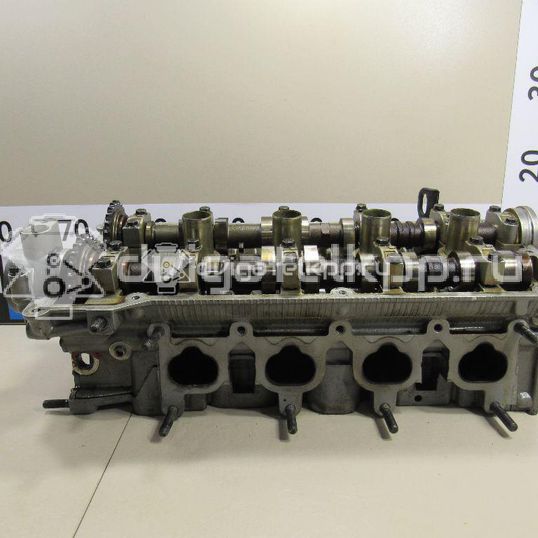 Фото Головка блока для двигателя G4EE для Hyundai / Kia 97 л.с 16V 1.4 л бензин
