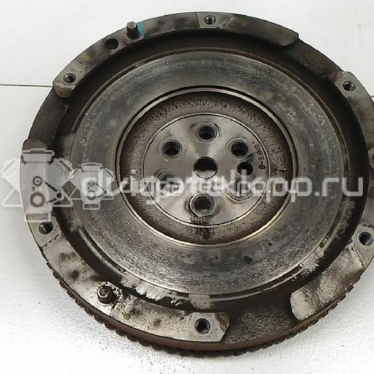 Фото Маховик для двигателя G3LA для Hyundai / Kia 67-82 л.с 12V 1.0 л Бензин/спирт 2320004000