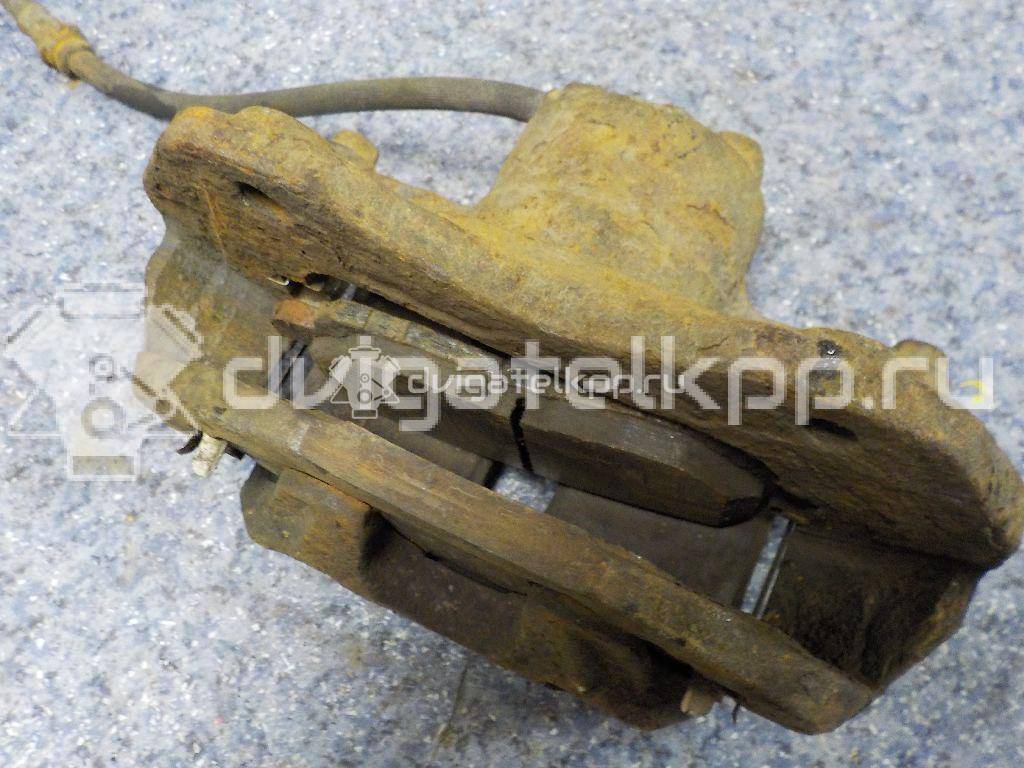 Фото Суппорт тормозной передний левый  MR955063 для Mitsubishi Lancer / Outlander / Galant / Space {forloop.counter}}