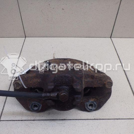 Фото Суппорт тормозной передний левый  MR955063 для Mitsubishi Lancer / Outlander / Galant / Space
