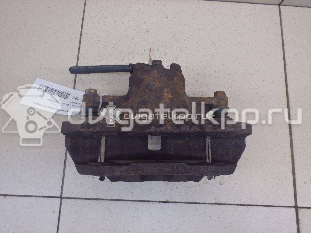 Фото Суппорт тормозной передний левый  MR955063 для Mitsubishi Lancer / Outlander / Galant / Space {forloop.counter}}