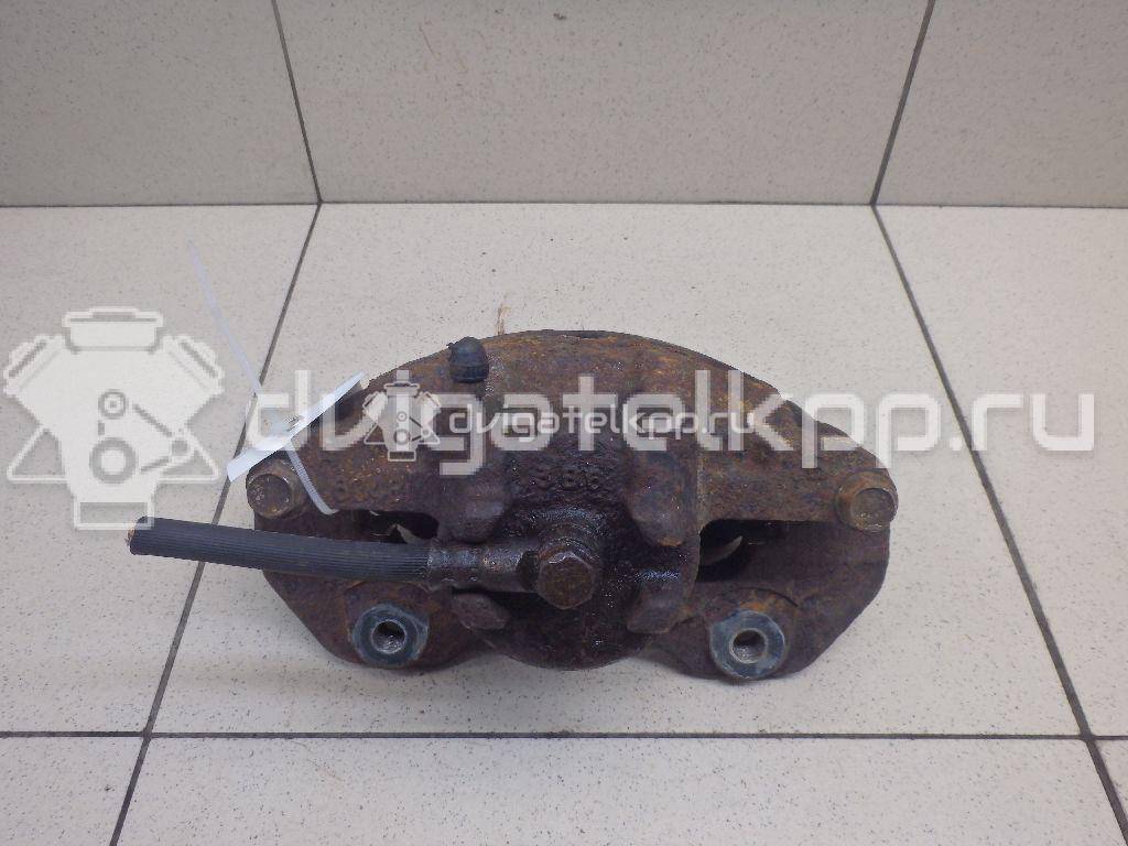 Фото Суппорт тормозной передний левый  MR955063 для Mitsubishi Lancer / Outlander / Galant / Space {forloop.counter}}