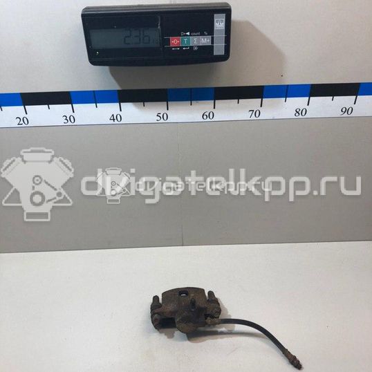 Фото Суппорт тормозной задний левый  MR955065 для Mitsubishi Lancer / Outlander / Grandis Na W