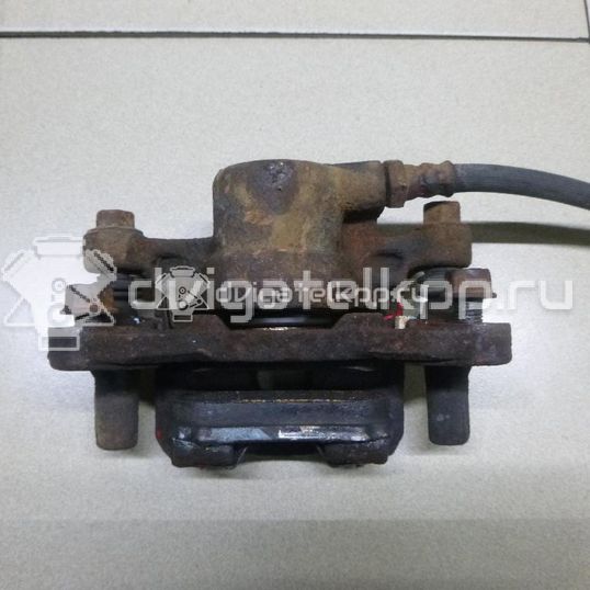 Фото Суппорт тормозной задний левый  MR955065 для Mitsubishi Lancer / Outlander / Grandis Na W