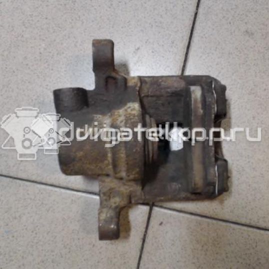 Фото Суппорт тормозной задний левый  MR955065 для Mitsubishi Lancer / Outlander / Grandis Na W