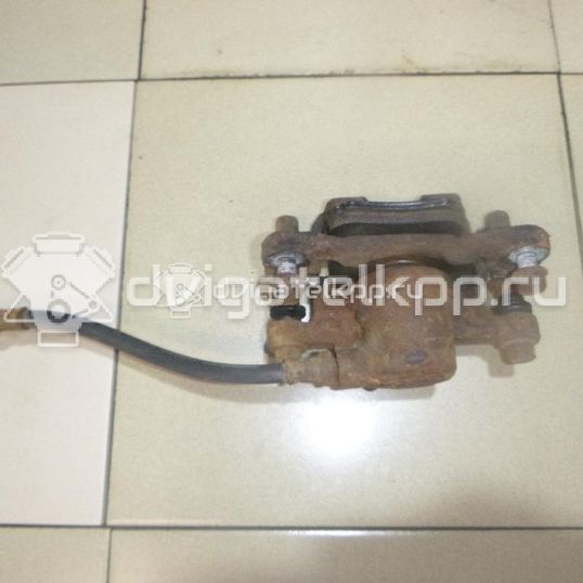 Фото Суппорт тормозной задний левый  MR955065 для Mitsubishi Lancer / Outlander / Grandis Na W