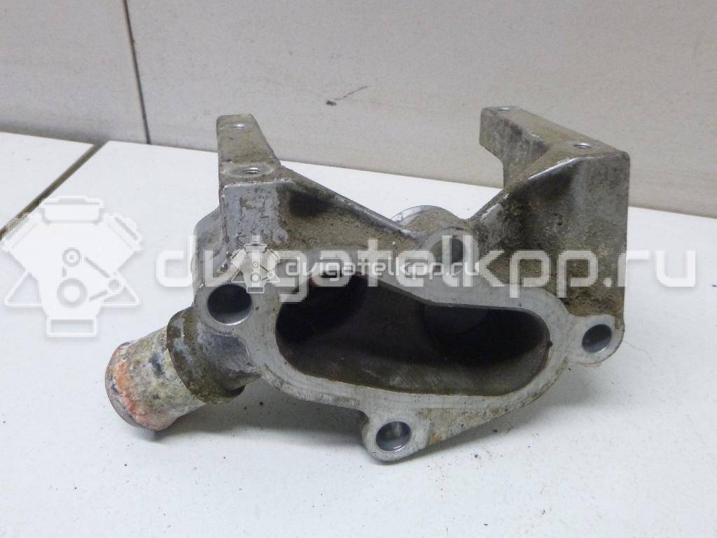 Фото Фланец двигателя системы охлаждения  1221325 для Ford Fiesta / Focus / Puma Ec {forloop.counter}}