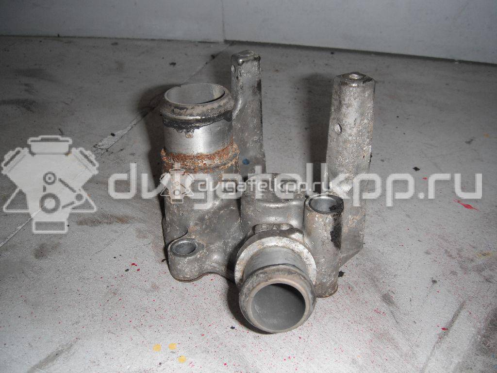Фото Фланец двигателя системы охлаждения  1221325 для Ford Fiesta / Focus / Puma Ec {forloop.counter}}