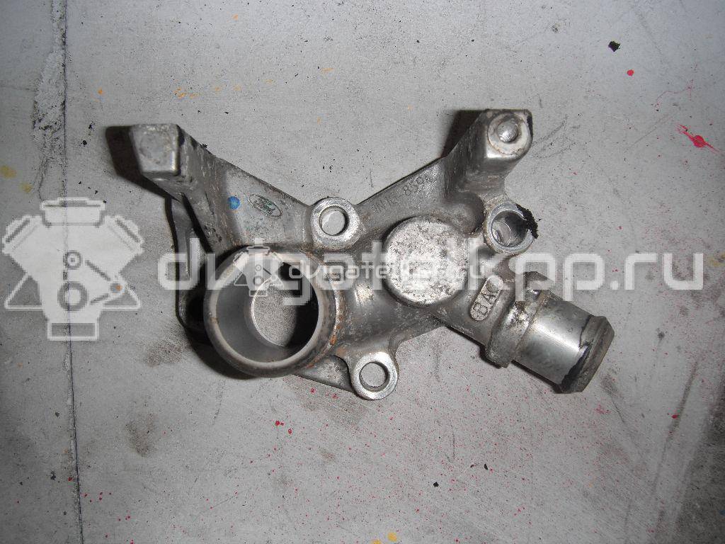 Фото Фланец двигателя системы охлаждения  1221325 для Ford Fiesta / Focus / Puma Ec {forloop.counter}}