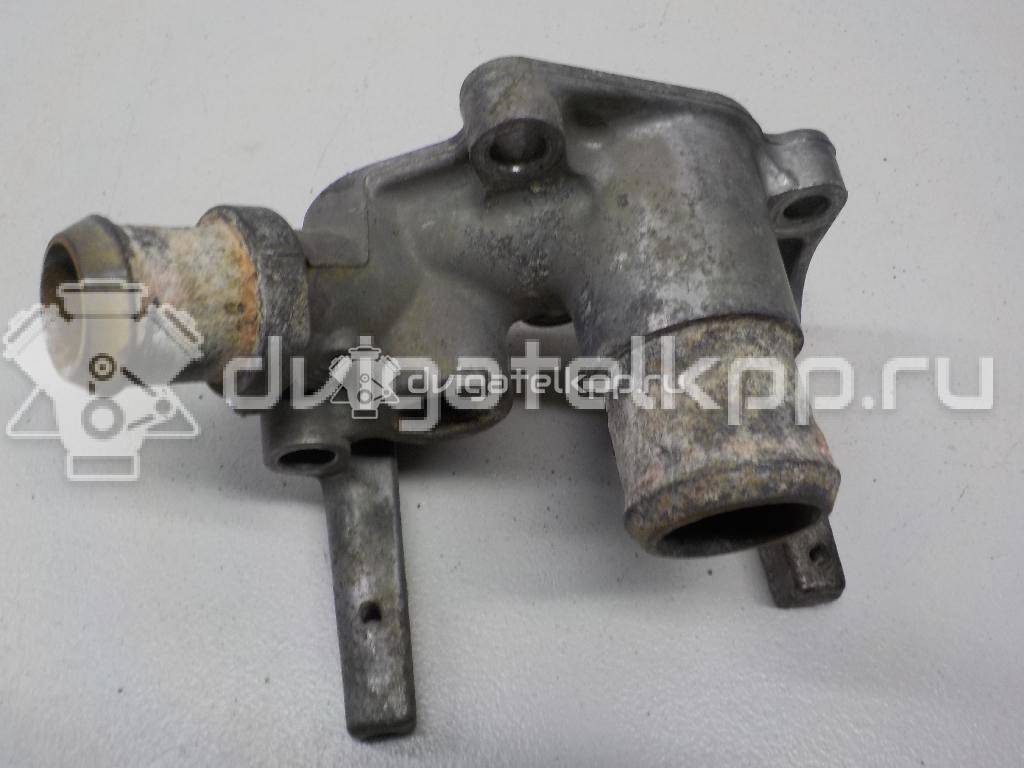Фото Фланец двигателя системы охлаждения  1221325 для Ford Fiesta / Focus / Puma Ec {forloop.counter}}