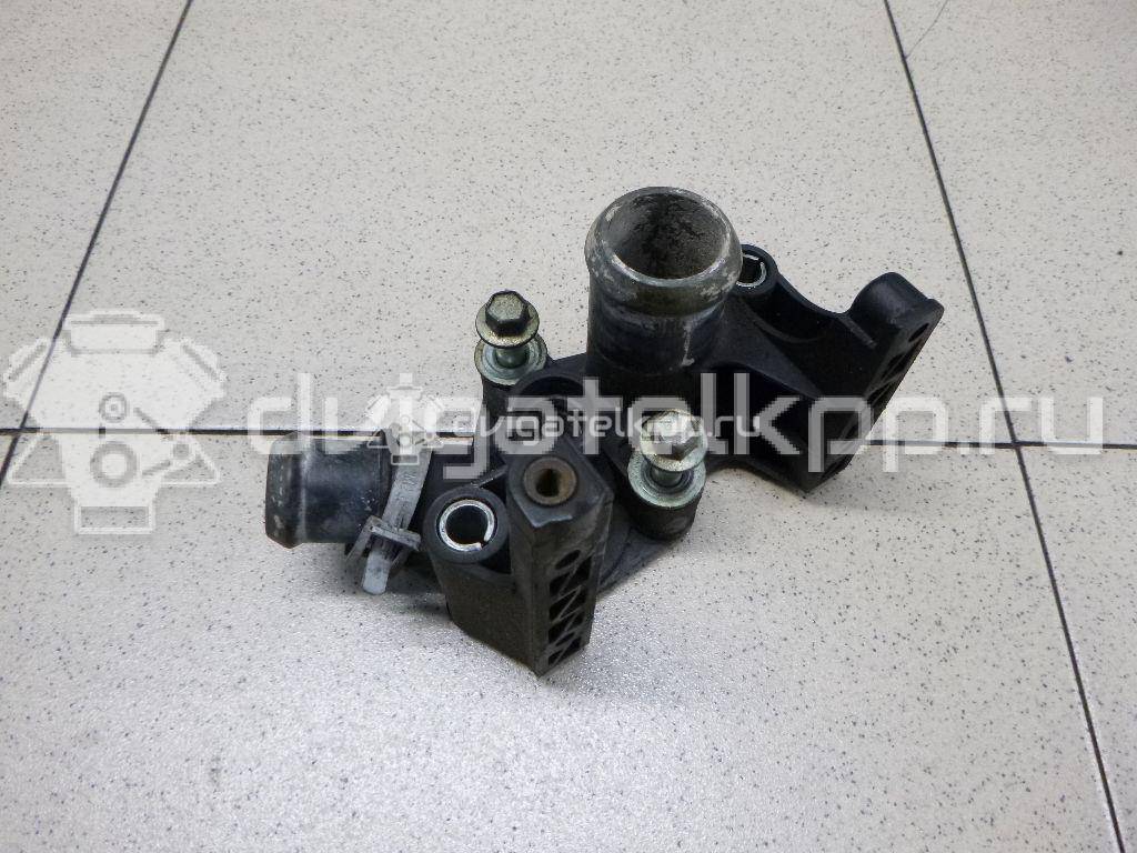 Фото Фланец двигателя системы охлаждения  1531004 для Ford Fiesta / Focus / Puma Ec / Fusion Ju {forloop.counter}}