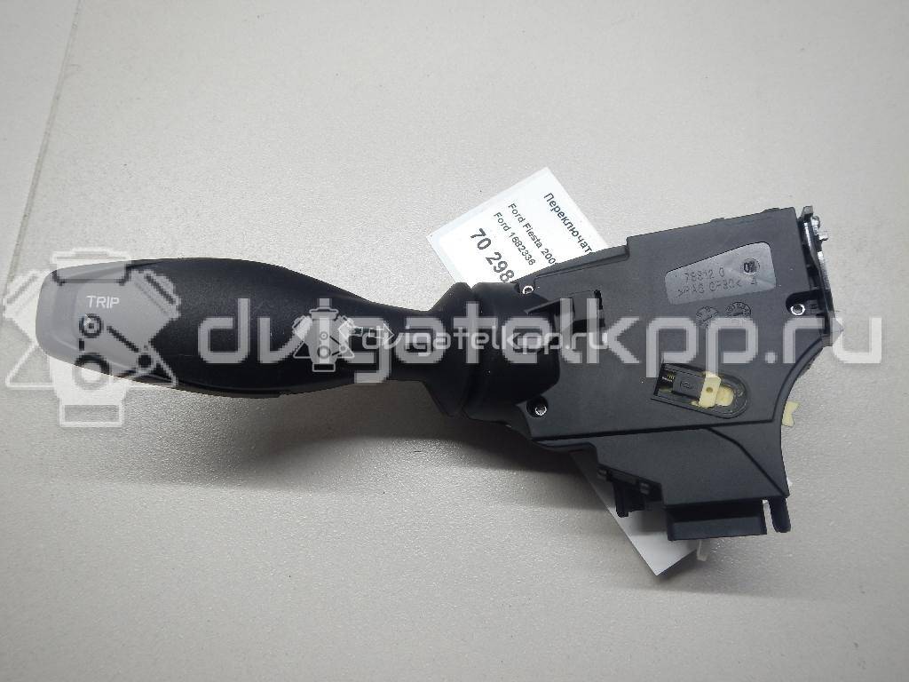 Фото Переключатель поворотов подрулевой  1682336 для Ford Fiesta {forloop.counter}}