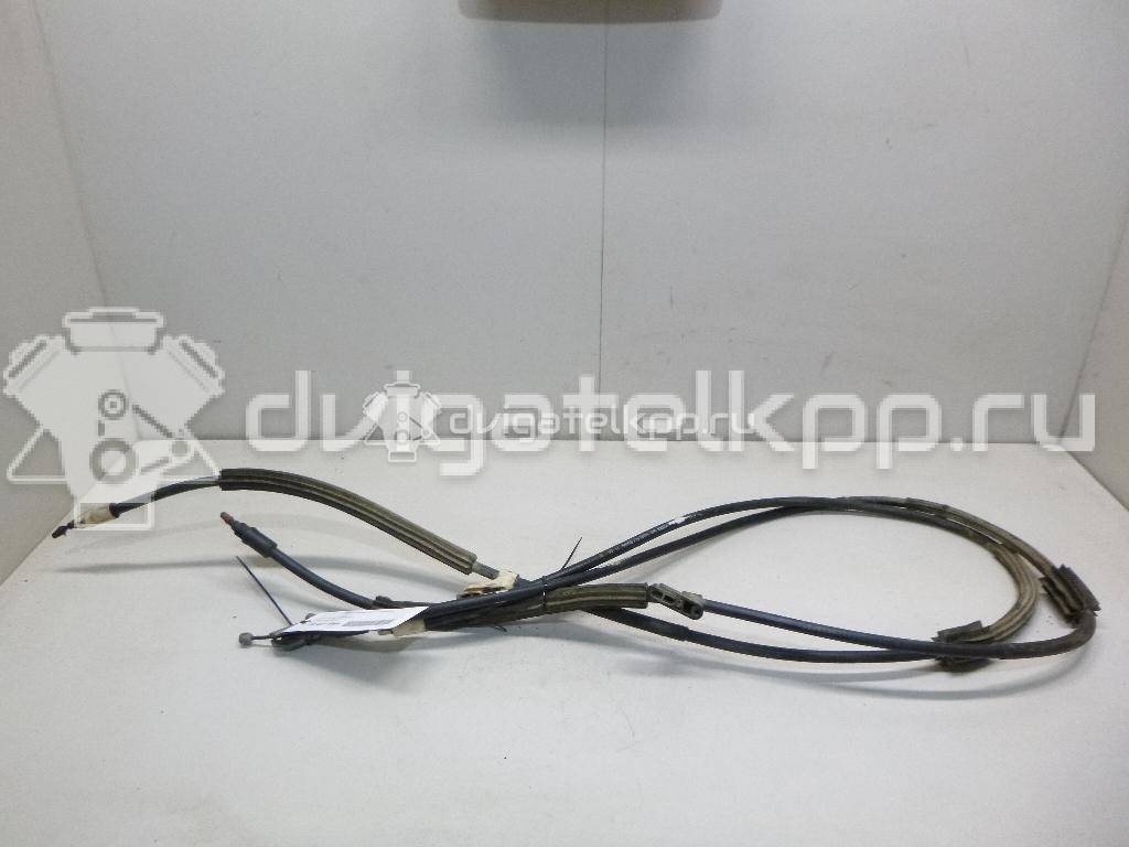 Фото Трос стояночного тормоза  1707757 для Ford Focus / C-Max {forloop.counter}}