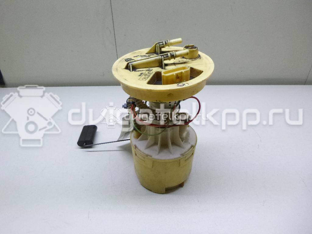 Фото Насос топливный электрический  1447513 для Ford Focus / C-Max {forloop.counter}}