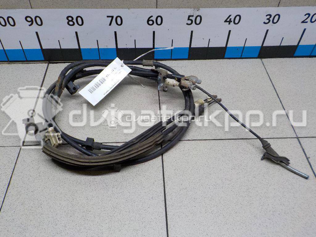 Фото Трос стояночного тормоза  1755767 для Ford Focus / C-Max {forloop.counter}}