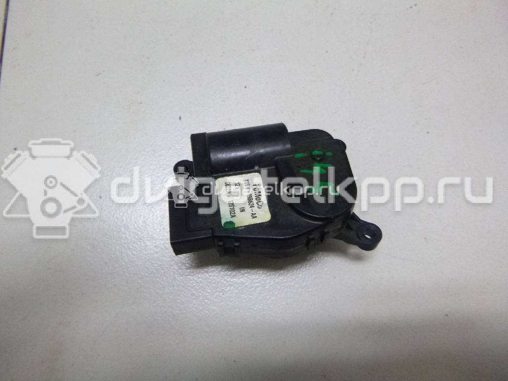 Фото Моторчик заслонки отопителя  av6n19b634aa для Ford Focus / Tourneo / Transit / C-Max {forloop.counter}}