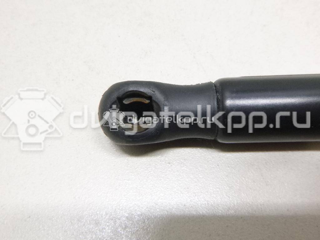 Фото Амортизатор двери багажника  8M51A406A10AC для Ford Focus / Sierra {forloop.counter}}