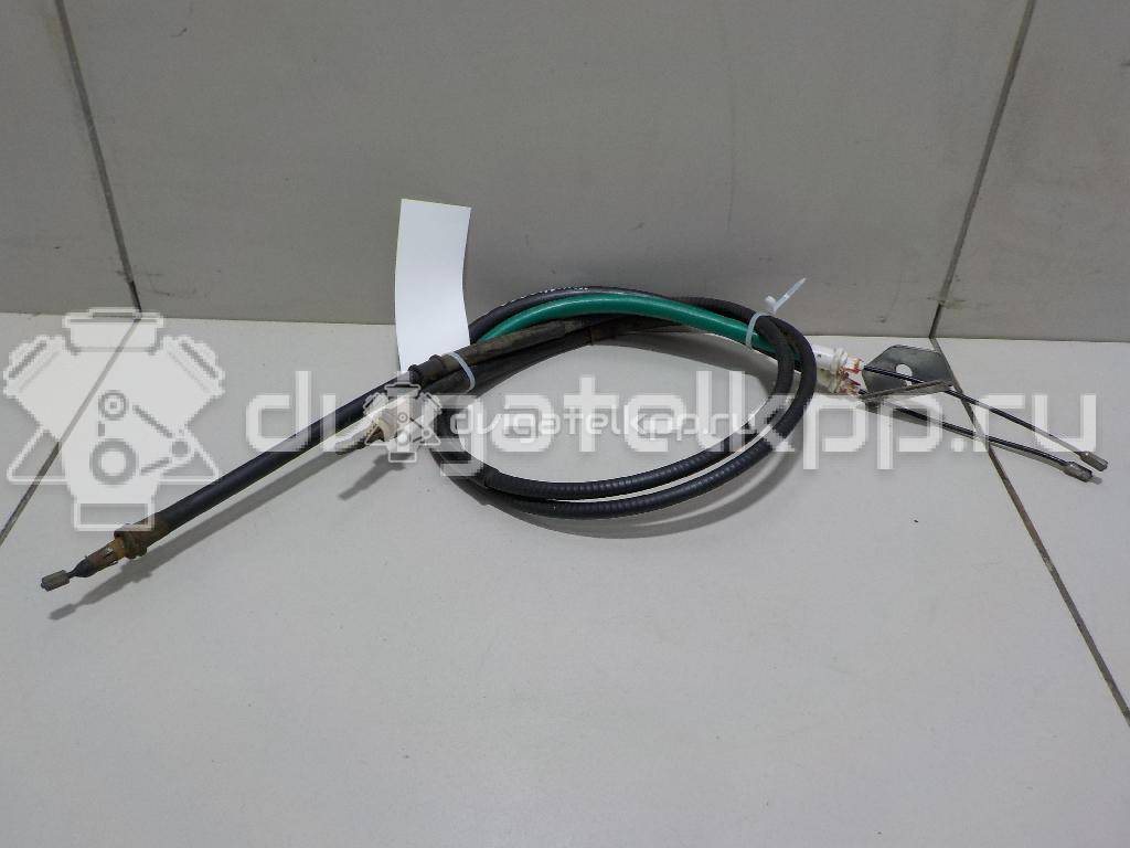 Фото Трос стояночного тормоза  1211024 для Ford Fiesta / Fusion Ju {forloop.counter}}