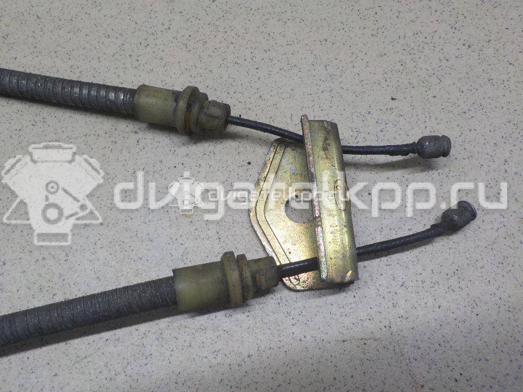 Фото Трос стояночного тормоза  1211024 для Ford Fiesta / Fusion Ju {forloop.counter}}
