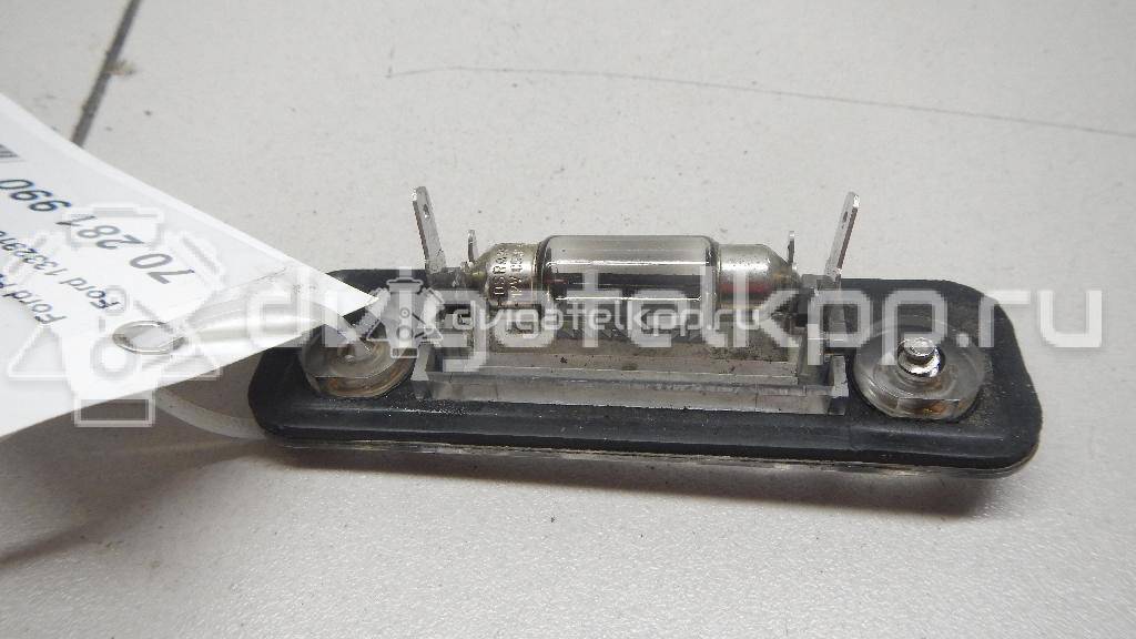Фото Фонарь подсветки номера  1332916 для Ford Fiesta / Mondeo / Fusion Ju {forloop.counter}}