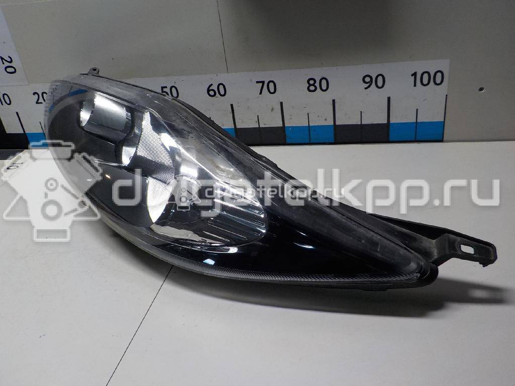 Фото Фара левая  1734615 для Ford Fiesta {forloop.counter}}