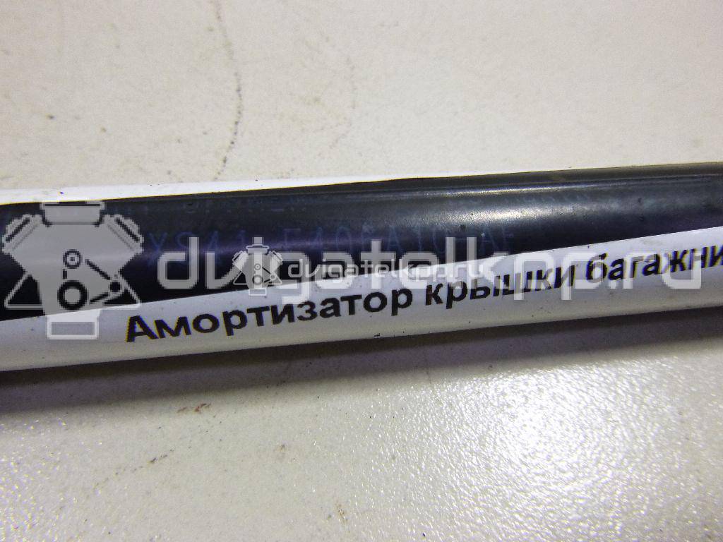 Фото Амортизатор крышки багажника  xs41f406a10af для Ford Focus {forloop.counter}}