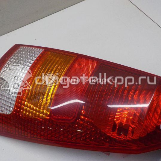 Фото Фонарь задний правый  1233322 для Ford Focus