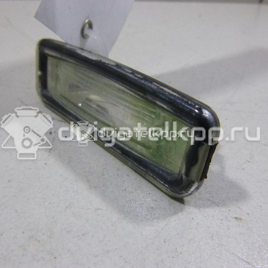 Фото Фонарь подсветки номера  1109489 для Ford Focus