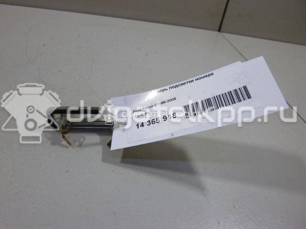 Фото Фонарь подсветки номера  1109489 для Ford Focus {forloop.counter}}