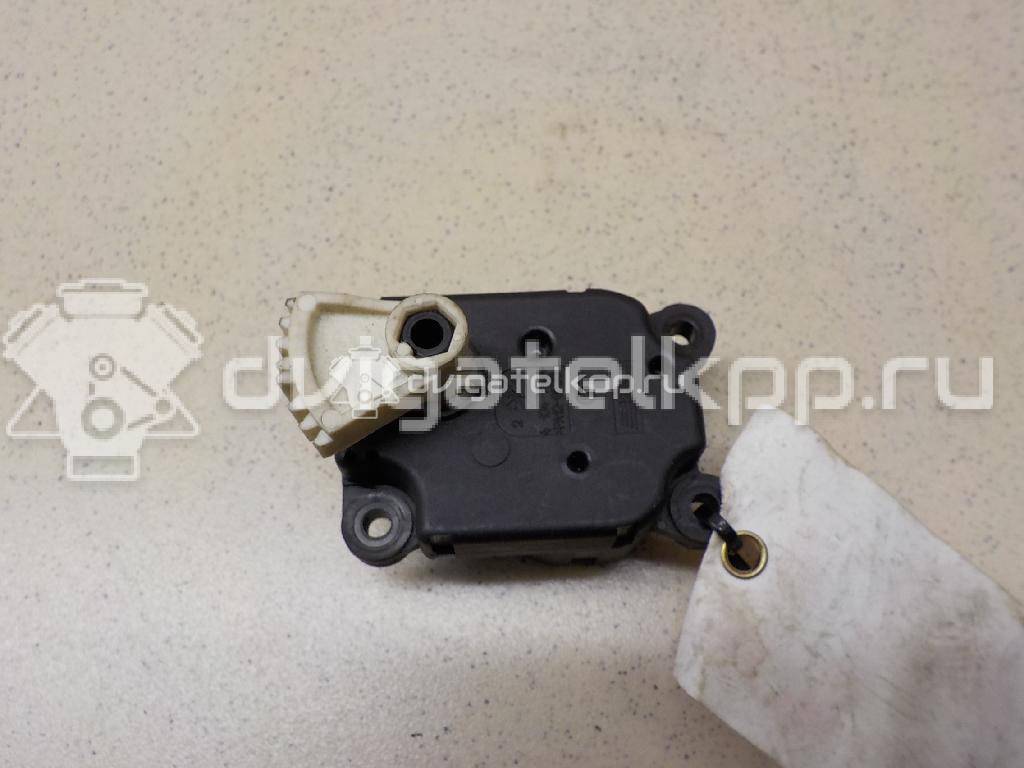 Фото Моторчик заслонки отопителя  1S7H19E616AA для Ford Focus / Mondeo {forloop.counter}}