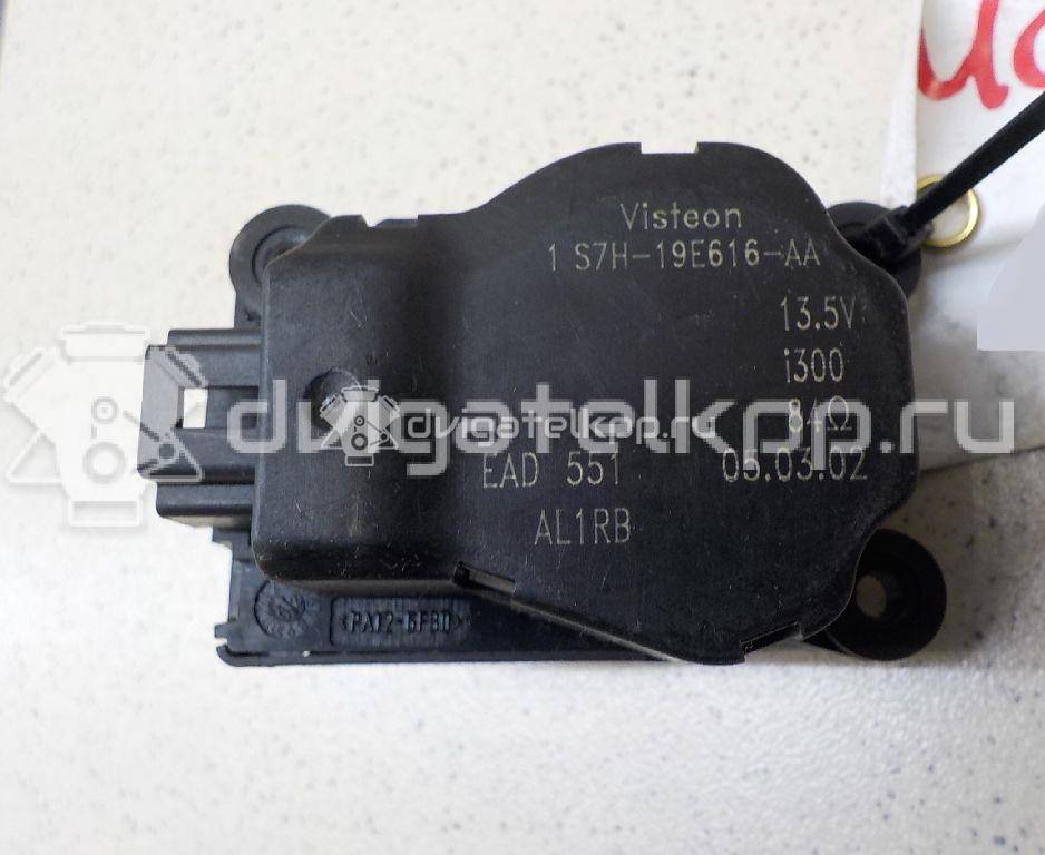 Фото Моторчик заслонки отопителя  1S7H19E616AA для Ford Focus / Mondeo {forloop.counter}}