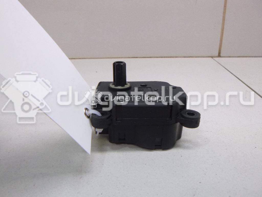 Фото Моторчик заслонки отопителя  1S7H19E616AA для Ford Focus / Mondeo {forloop.counter}}