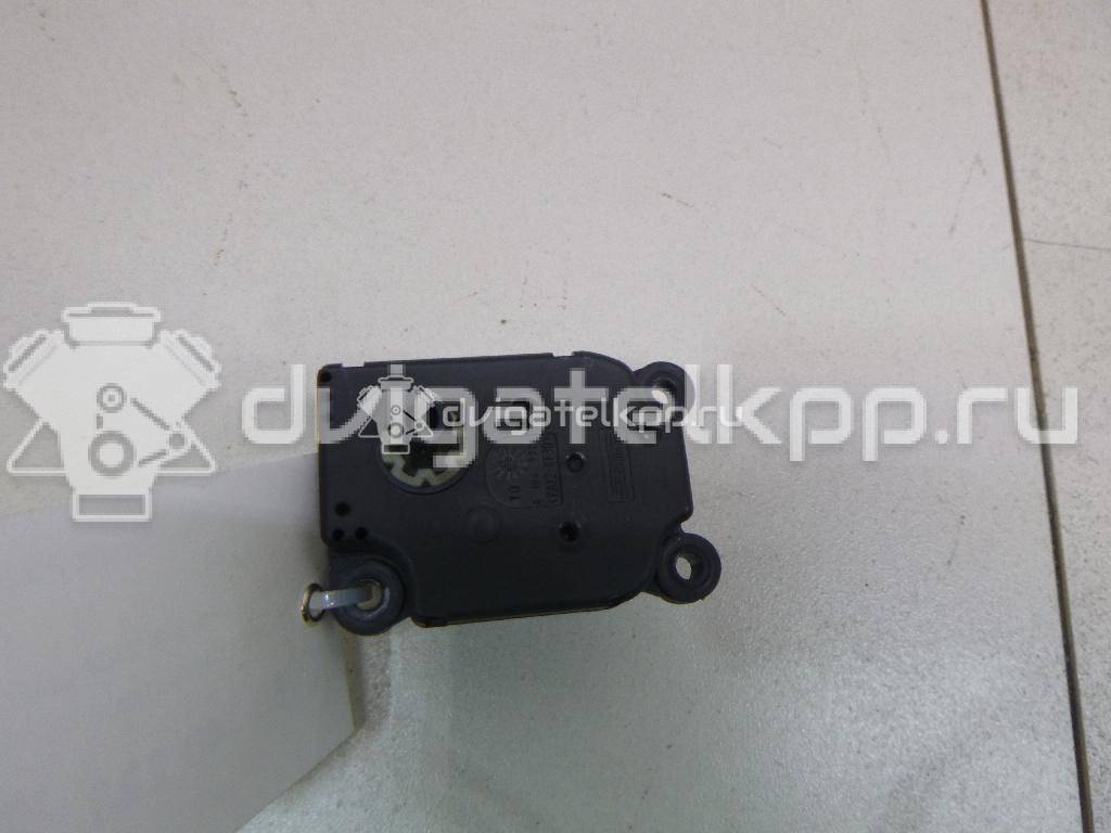 Фото Моторчик заслонки отопителя  1S7H19E616AA для Ford Focus / Mondeo {forloop.counter}}