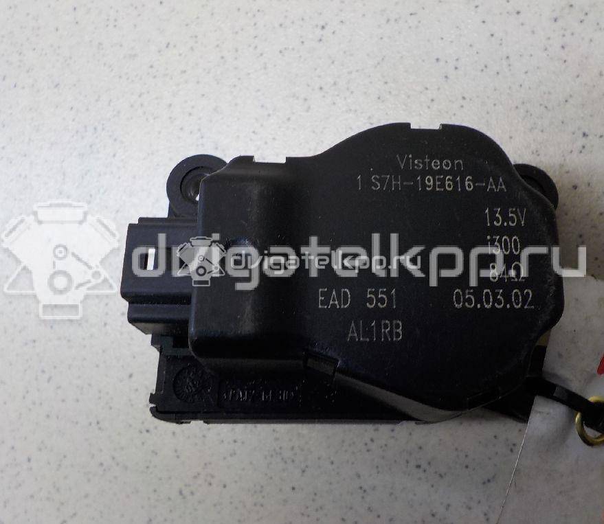 Фото Моторчик заслонки отопителя  1S7H19E616AA для Ford Focus / Mondeo {forloop.counter}}