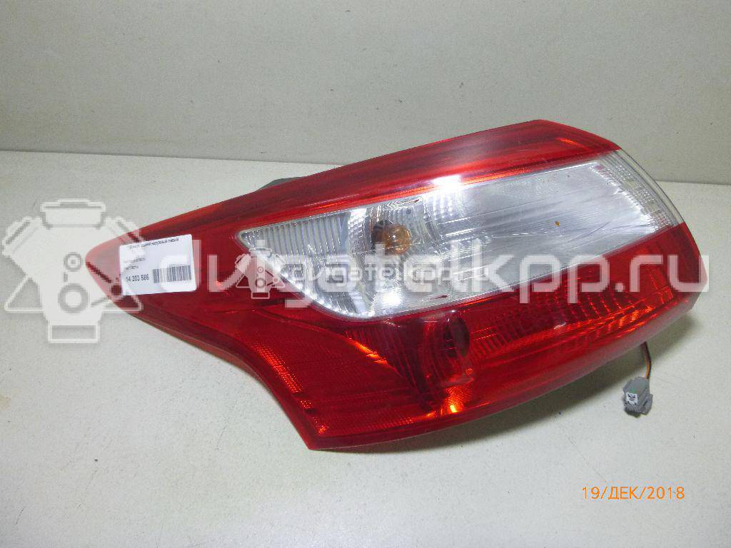 Фото Фонарь задний наружный левый  1792714 для Ford Focus {forloop.counter}}