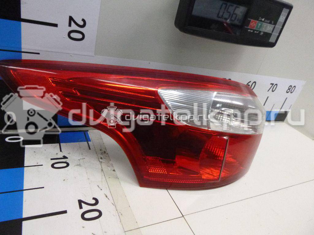 Фото Фонарь задний наружный левый  1785514 для Ford Focus {forloop.counter}}