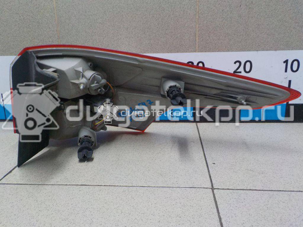 Фото Фонарь задний наружный левый  1785514 для Ford Focus {forloop.counter}}