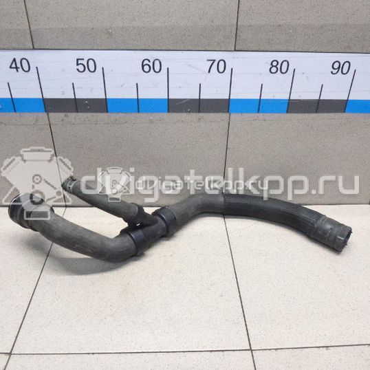 Фото Патрубок радиатора  1496510 для Ford Galaxy / Mondeo