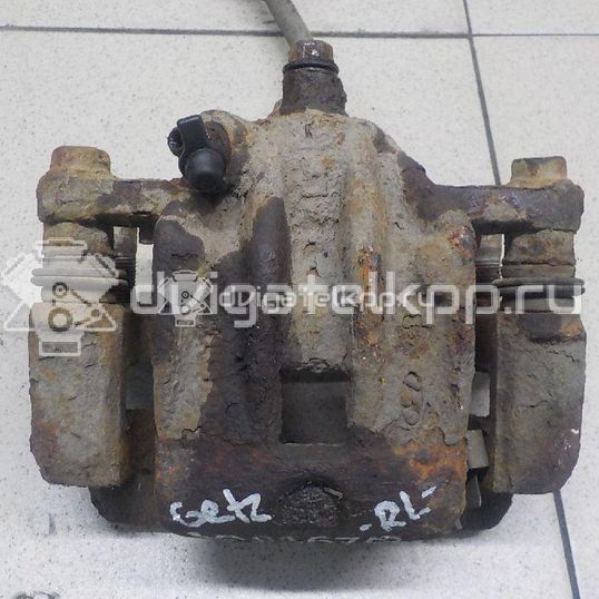 Фото Суппорт тормозной задний левый  583001C800 для Hyundai Getz Tb