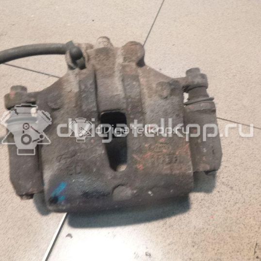 Фото Суппорт тормозной передний левый  581101H000 для Hyundai I30