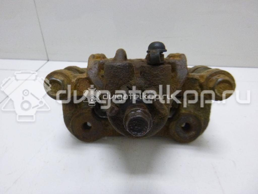 Фото Суппорт тормозной задний левый  582101H300 для Hyundai I30 {forloop.counter}}