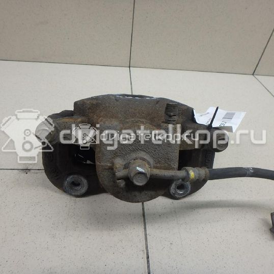 Фото Суппорт тормозной передний левый  581803ZA00 для Hyundai I40 Vf