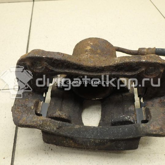 Фото Суппорт тормозной передний левый  581104L000 для Hyundai Accent / I20